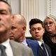 Kyle Rittenhouse, third from left, stands with his legal team, from left, Mark Richards, Corey Chirafisi and Natalie Wisco as the jury leaves the room for the day at the Kenosha County Courthouse in Kenosha, Wis., on Friday, Nov. 5, 2021.